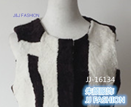 lady‘s long section natural lamb fur black and white combination coat